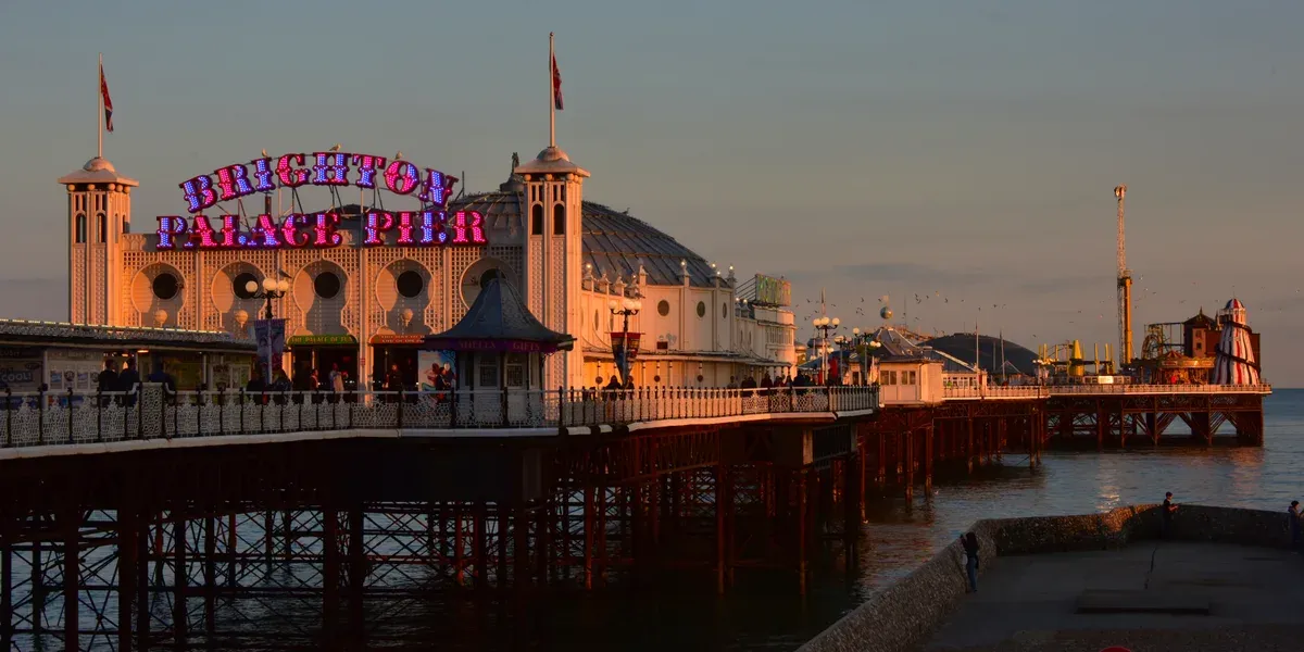 Brighton Palace Pier at golden hour on a day trip from London to Brighton