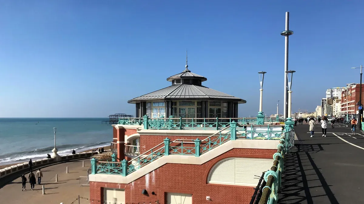 Brighton seafront promenade with the i360 tower on a day trip from London to Brighton