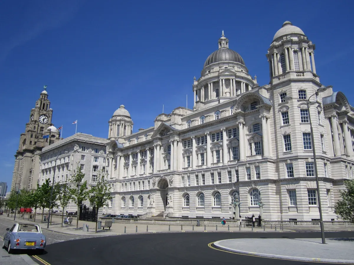 The Three Graces buildings at Pier Head in Liverpool on a day trip from London
